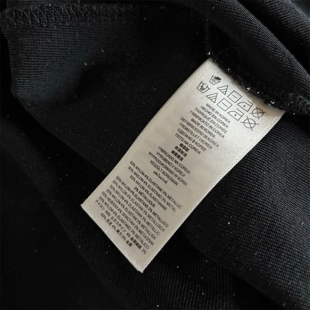 Michael Kors Black Silver Shimmer Metallic Logo O Ring Asymmetric Neckline Top